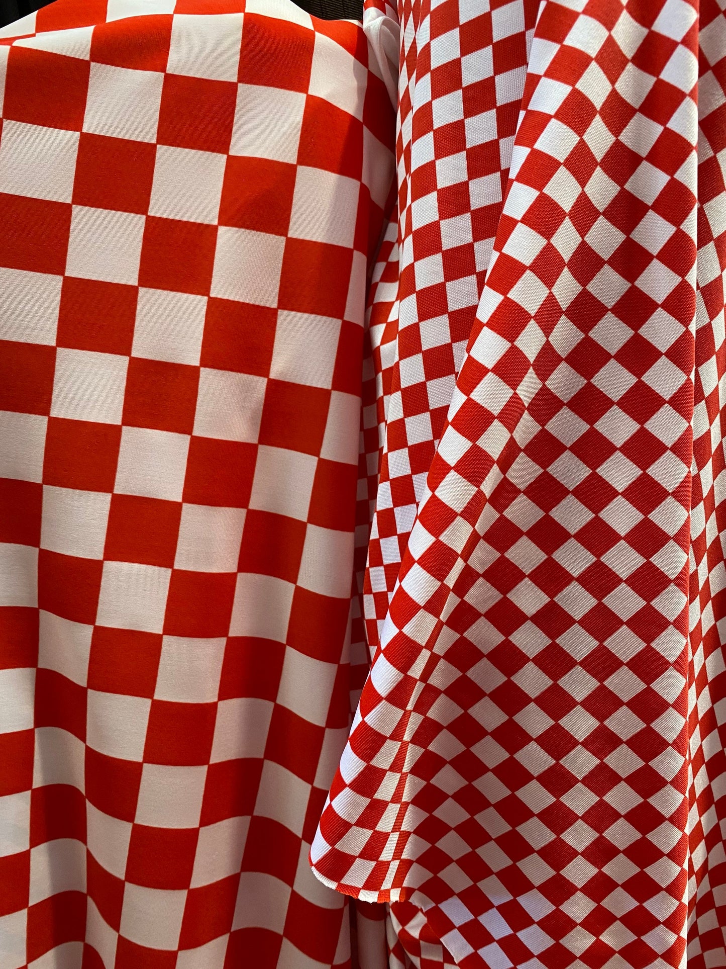 New poly spandex Checkered design 1”-1/2” print on poly spandex 4-way stretch 58/60” Sold by the YD. Ships worldwide from Los Angeles CA.