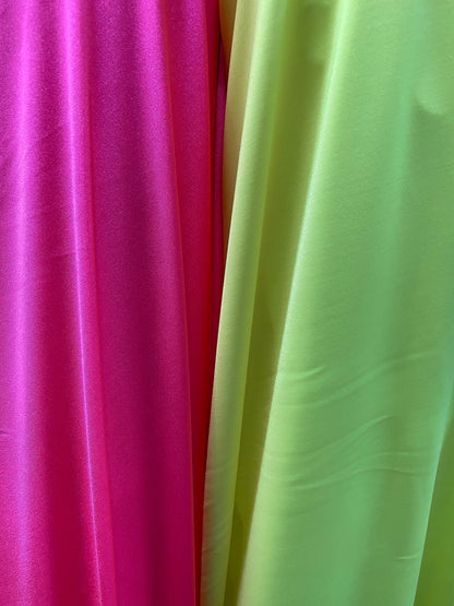 Neon pink & neon yellow solid nylon spandex best quality 4-way stretch 58/60” Sold by the YD. Ships worldwide from Los Angeles California US