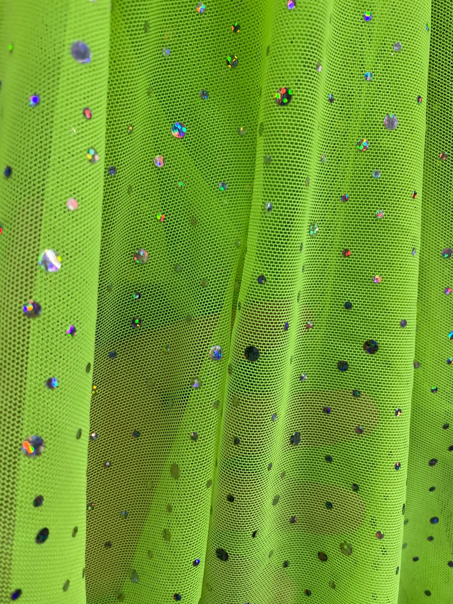 New power mesh neon green with hologram sequins all over 4-way stretch 58/60” Sold by the YD. Ships worldwide from Los Angeles California US