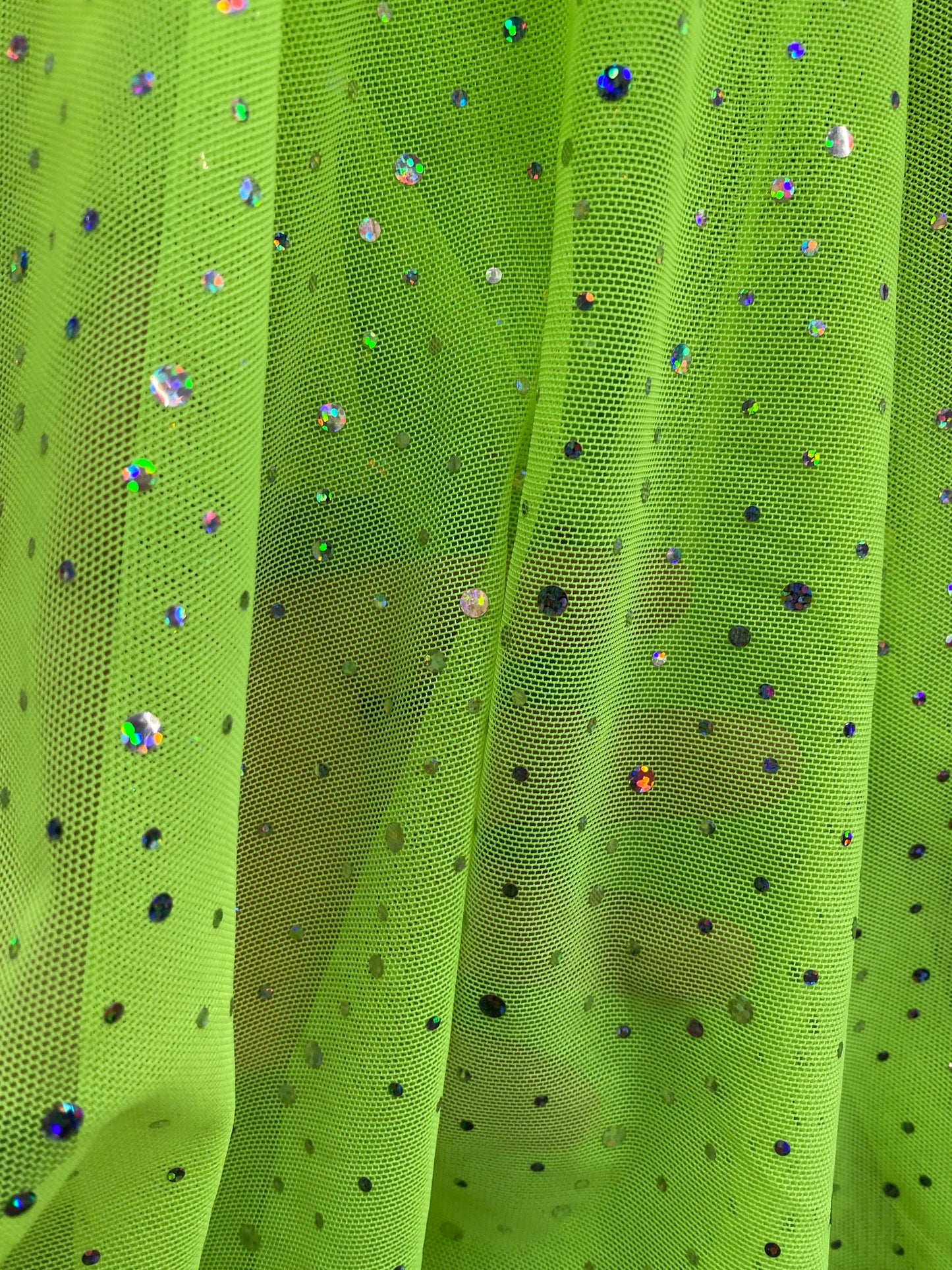 New power mesh neon green with hologram sequins all over 4-way stretch 58/60” Sold by the YD. Ships worldwide from Los Angeles California US