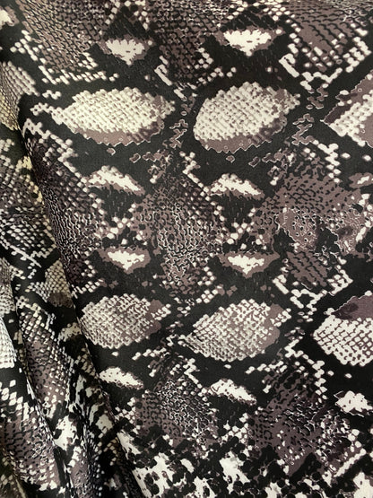 New Exotic snake design print on poly techno spandex 2-way stretch 58/60” Sold by the YD. Ships worldwide from Los Ángeles California USA.