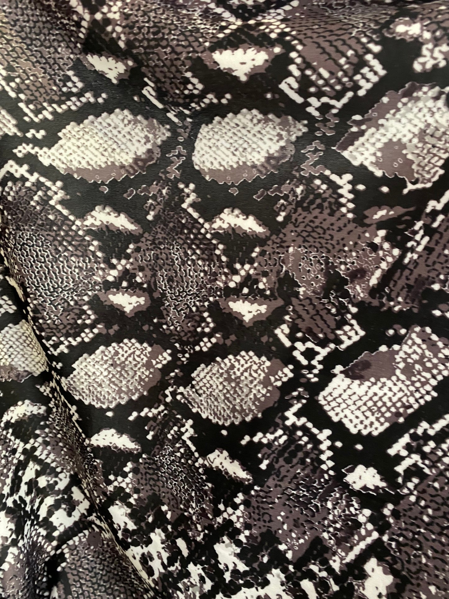 New Exotic snake design print on poly techno spandex 2-way stretch 58/60” Sold by the YD. Ships worldwide from Los Ángeles California USA.