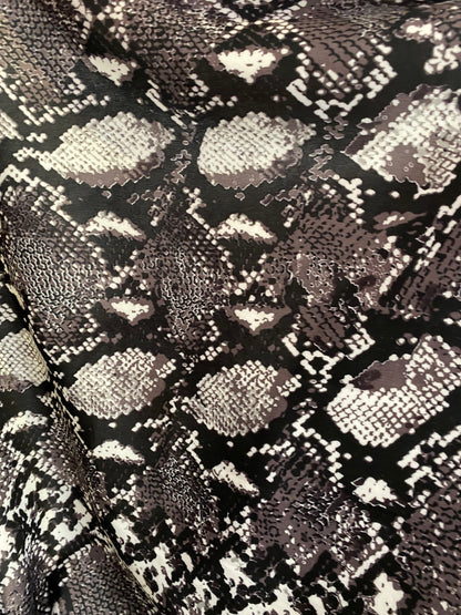 New Exotic snake design print on poly techno spandex 2-way stretch 58/60” Sold by the YD. Ships worldwide from Los Ángeles California USA.