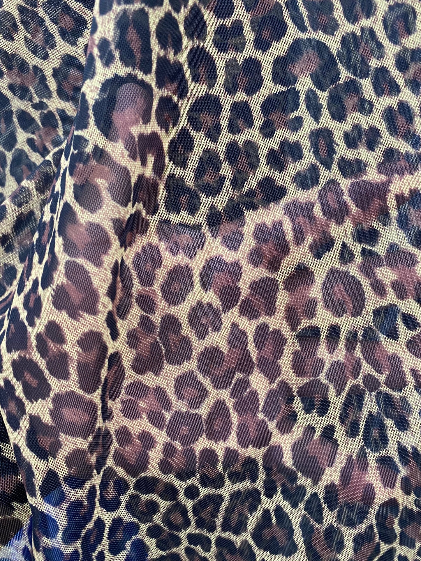 New exotic Cheetah print on nylon power mesh 4way stretch 58/60” Sold by the YD. Ships worldwide from Los Angeles California USA.