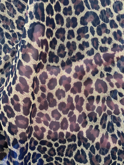 New exotic Cheetah print on nylon power mesh 4way stretch 58/60” Sold by the YD. Ships worldwide from Los Angeles California USA.