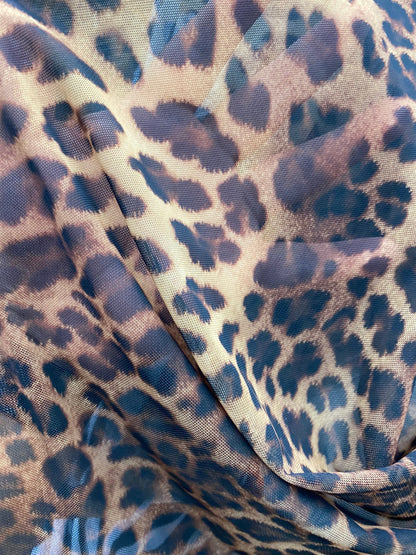 New Exotic leopard design taupe/brown print on nylon power mesh 4-way stretch 58/60” Sold by the YD. Ships worldwide from Los Angeles CA.