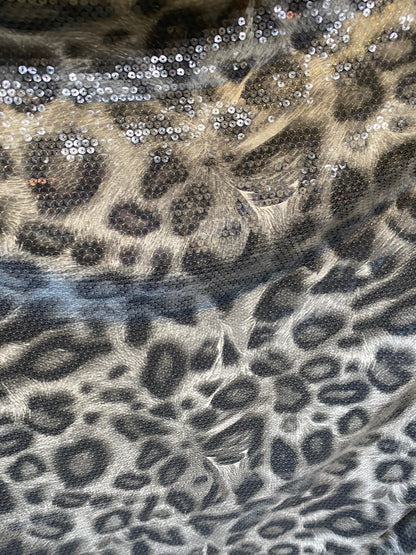 New Exotic leopard design with clear sequins all over lycra base 2-way stretch 58/60” Sold by the YD. Ships worldwide from Los Angeles cali