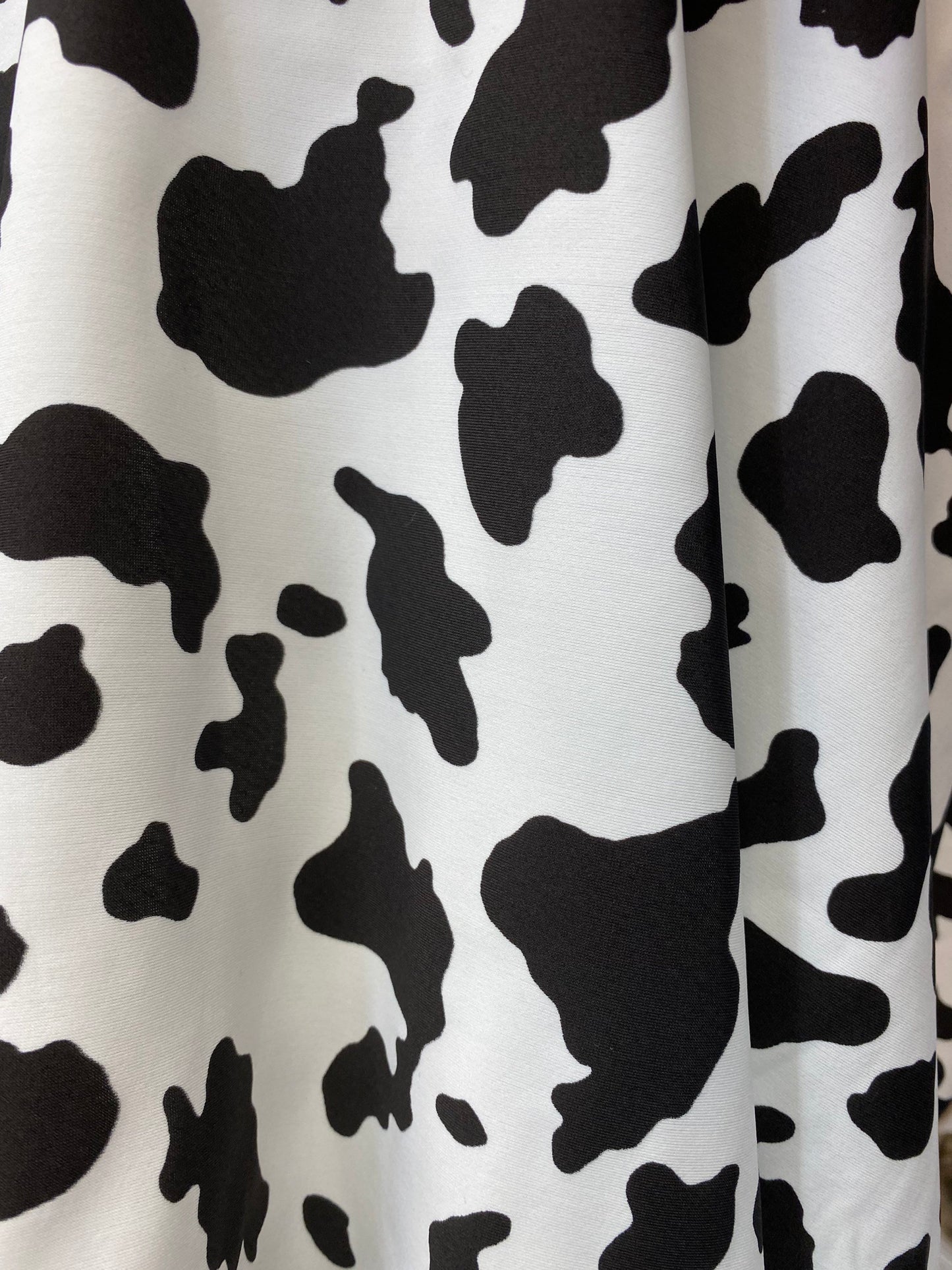 New Cow design print on great quality of nylon spandex 4-way stretch 58/60” Sold by the YD. Ships worldwide from Los Angeles California USA.