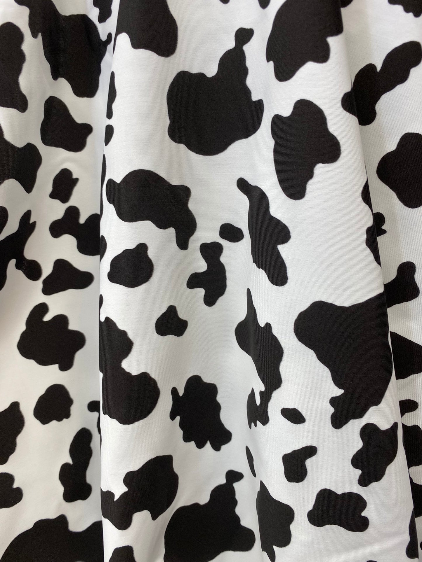 New Cow design print on great quality of nylon spandex 4-way stretch 58/60” Sold by the YD. Ships worldwide from Los Angeles California USA.