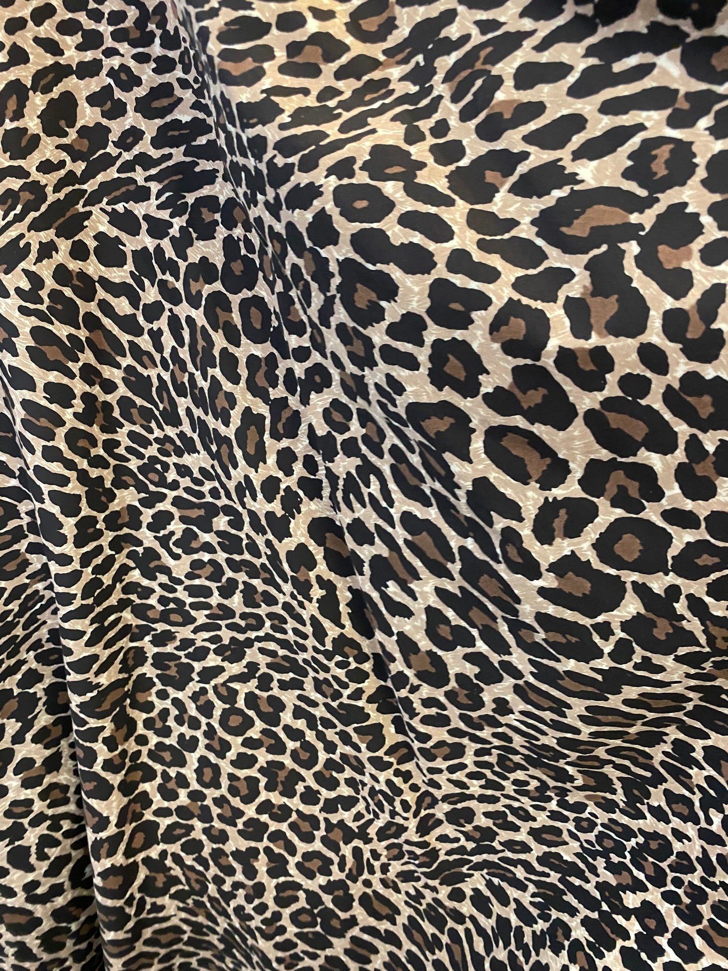 100% cotton New Exotic leopard design very soft fabric non stretch fabric 54/55” Sold by the YD. Ships worldwide from Los Angeles CA.