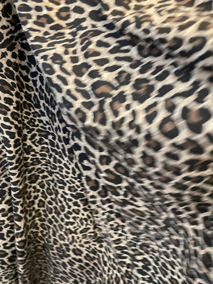 100% cotton New Exotic leopard design very soft fabric non stretch fabric 54/55” Sold by the YD. Ships worldwide from Los Angeles CA.