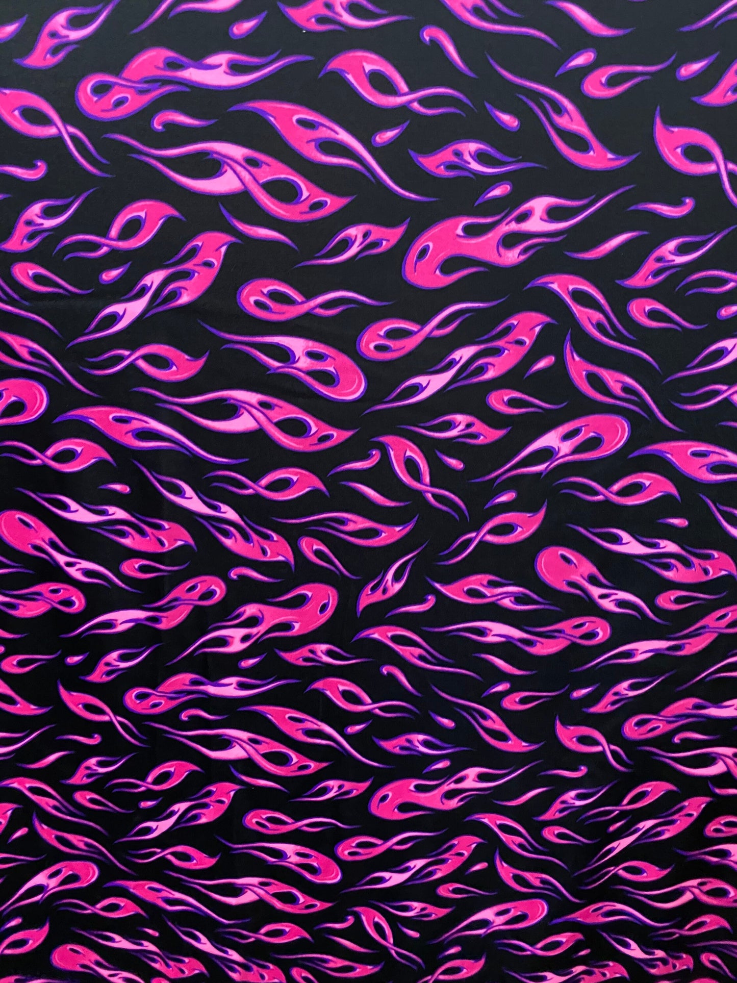 New modern hot flames design it glows in the dark with a black light print on best quality of nylon spandex 4-way stretch 58/60”