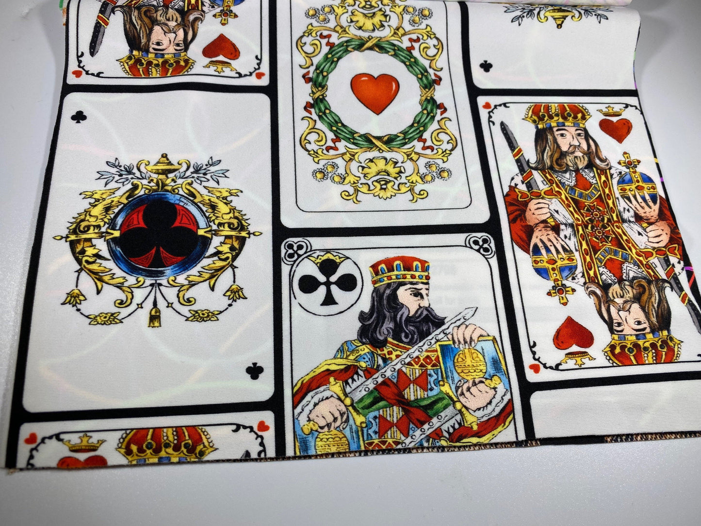 New king cards design playing cards style print on best quality of nylon spandex 4-way stretch 58/60” Sold by the YD.