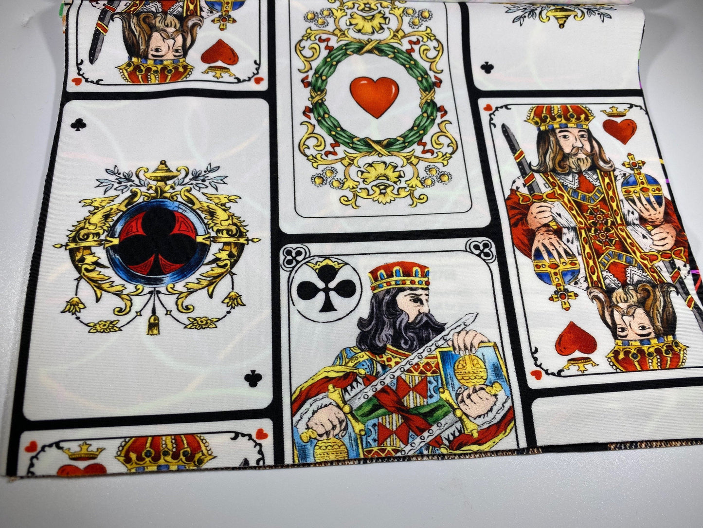 New king cards design playing cards style print on best quality of nylon spandex 4-way stretch 58/60” Sold by the YD.