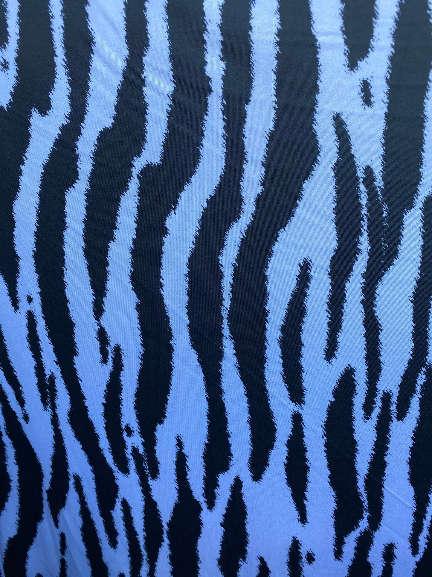 New Bengal tiger design print on nylon spandex 4-way stretch 58/60” Sold by the YD. Ships worldwide from Los Angeles California USA.