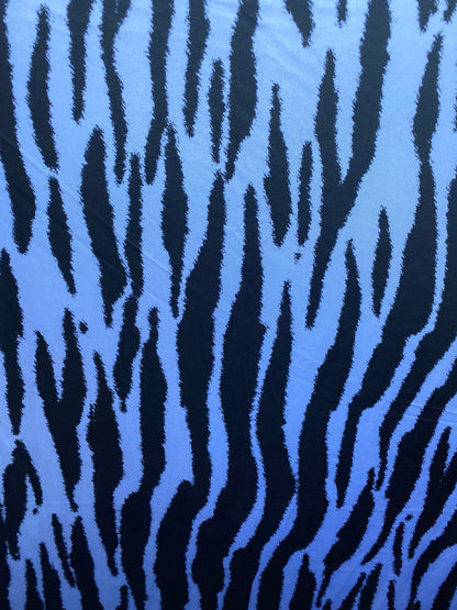 New Bengal tiger design print on nylon spandex 4-way stretch 58/60” Sold by the YD. Ships worldwide from Los Angeles California USA.