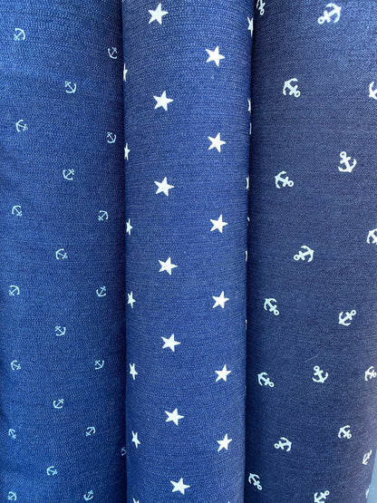 New stretch denim anchor design and stars design 2-way stretch 54/55” Sold by the YD. Ships worldwide from Los Angeles California USA.