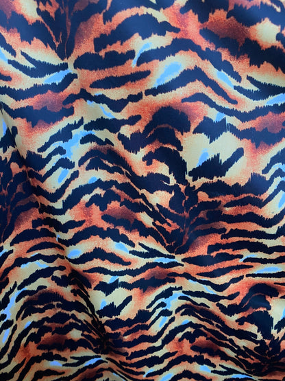 Tiger design exotic animal print on poly spandex 4-way stretch 58/60” Sold by the YD. Ships worldwide from Los Angeles California USA.