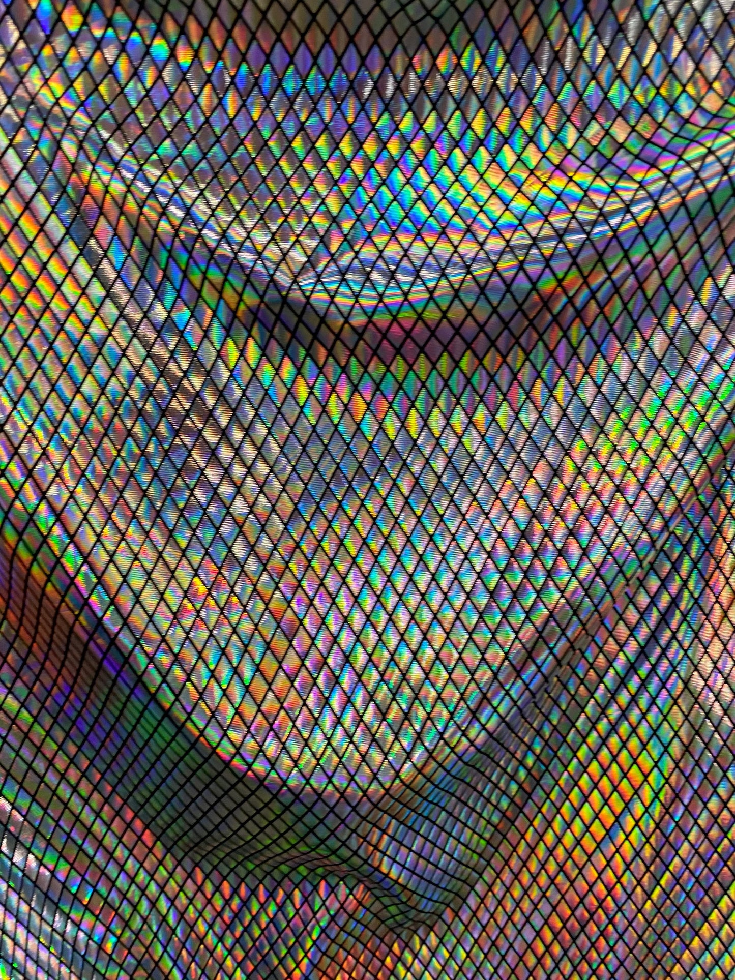 New modern diamond design poly spandex with iridescent silver foil 2-way stretch 58/60” Sold by the YD. Ships worldwide from Los Angeles CA.