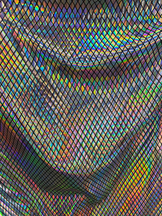 New modern diamond design poly spandex with iridescent silver foil 2-way stretch 58/60” Sold by the YD. Ships worldwide from Los Angeles CA.