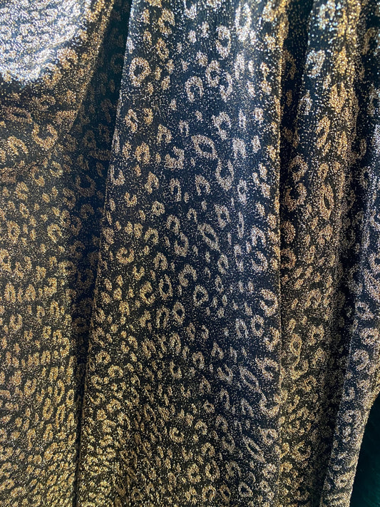 New metallic leopard design in metallic poly spandex 2-way stretch 58/60” Sold by the YD. Ships worldwide from Los Angeles California USA.