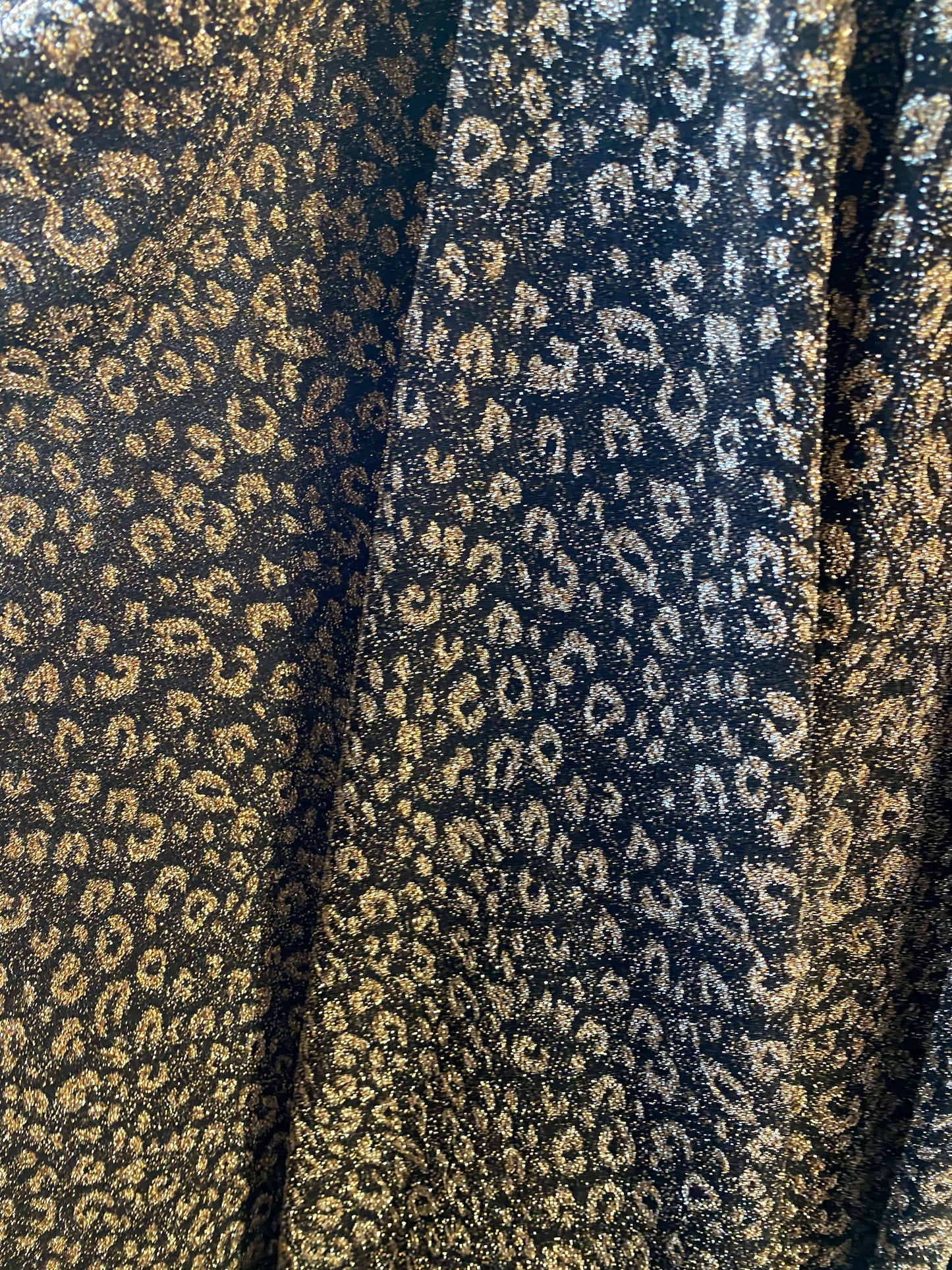 New metallic leopard design in metallic poly spandex 2-way stretch 58/60” Sold by the YD. Ships worldwide from Los Angeles California USA.
