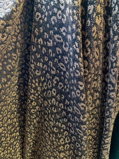 New metallic leopard design in metallic poly spandex 2-way stretch 58/60” Sold by the YD. Ships worldwide from Los Angeles California USA.
