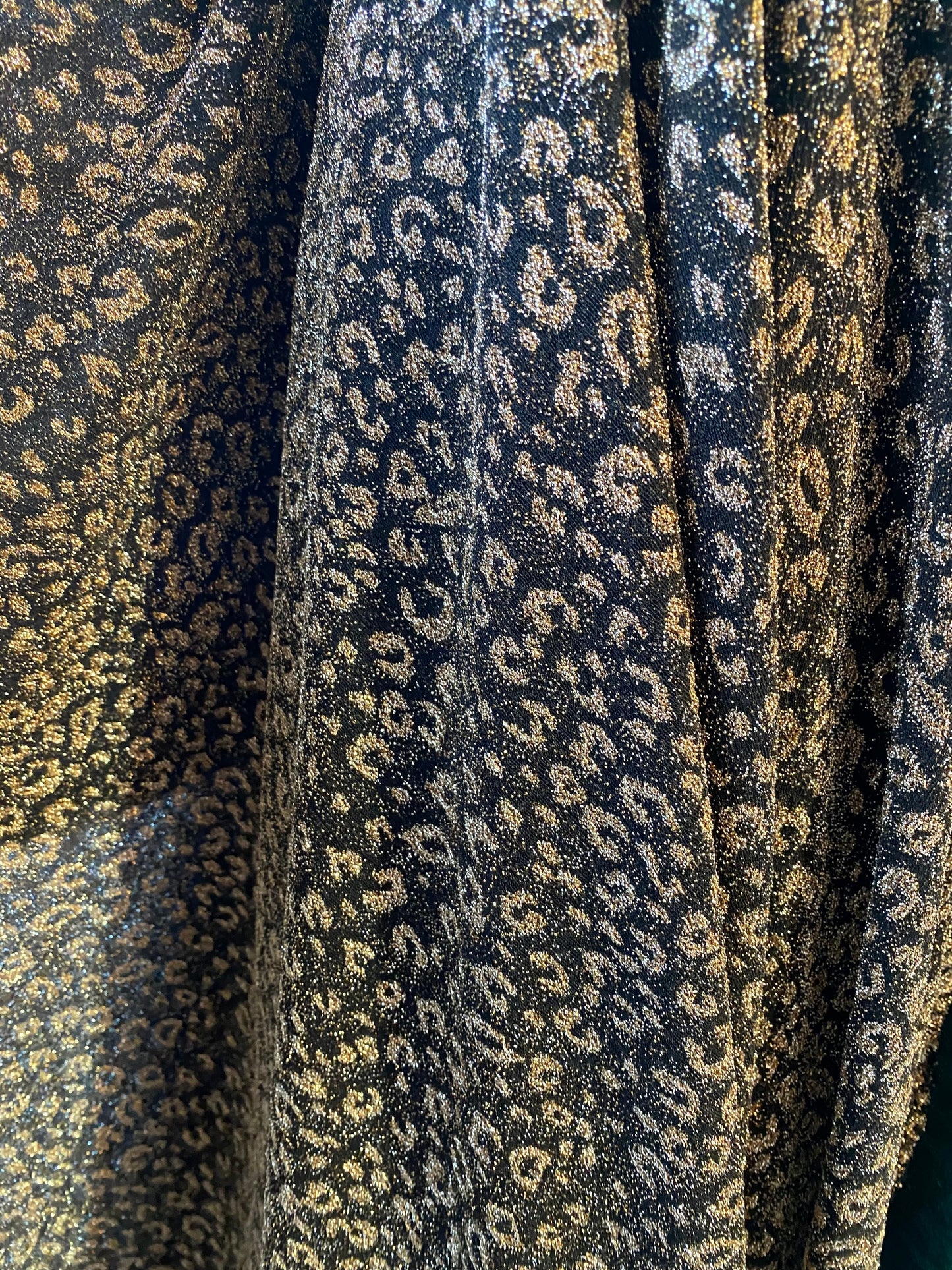 New metallic leopard design in metallic poly spandex 2-way stretch 58/60” Sold by the YD. Ships worldwide from Los Angeles California USA.