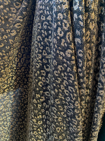 New metallic leopard design in metallic poly spandex 2-way stretch 58/60” Sold by the YD. Ships worldwide from Los Angeles California USA.