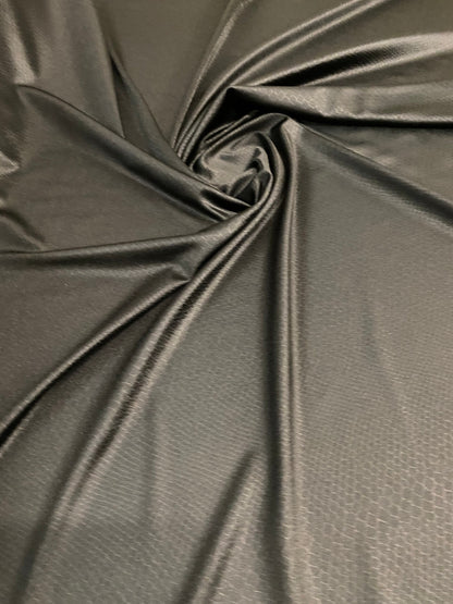 Dragon skin jumbo embossed great quality of nylon spandex 4-way stretch 58/60” Sold by the YD. Ships worldwide from Los Angeles California