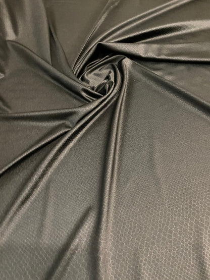 Dragon skin jumbo embossed great quality of nylon spandex 4-way stretch 58/60” Sold by the YD. Ships worldwide from Los Angeles California