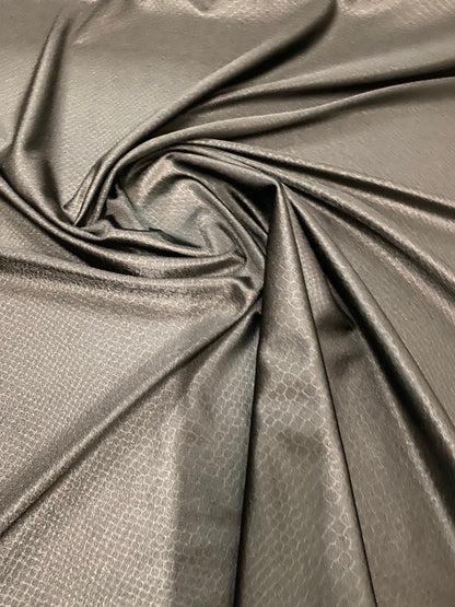 Dragon skin jumbo embossed great quality of nylon spandex 4-way stretch 58/60” Sold by the YD. Ships worldwide from Los Angeles California