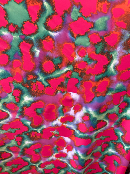 New lava design red/pink/ green print on best quality of nylon spandex 4-way stretch 58/60” Sold by the YD. Ships Worldwide from Los Angeles