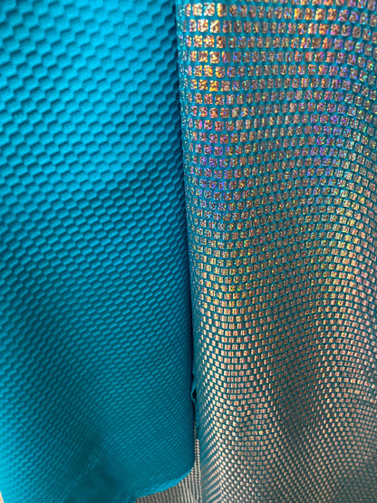 Square hologram sequins on nylon spandex 4-way stretch purple/silver 48/50” Sold by the YD. Ships worldwide from Los Angeles California USA.