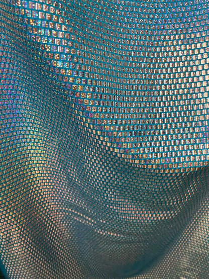 Square hologram sequins on nylon spandex 4-way stretch purple/silver 48/50” Sold by the YD. Ships worldwide from Los Angeles California USA.