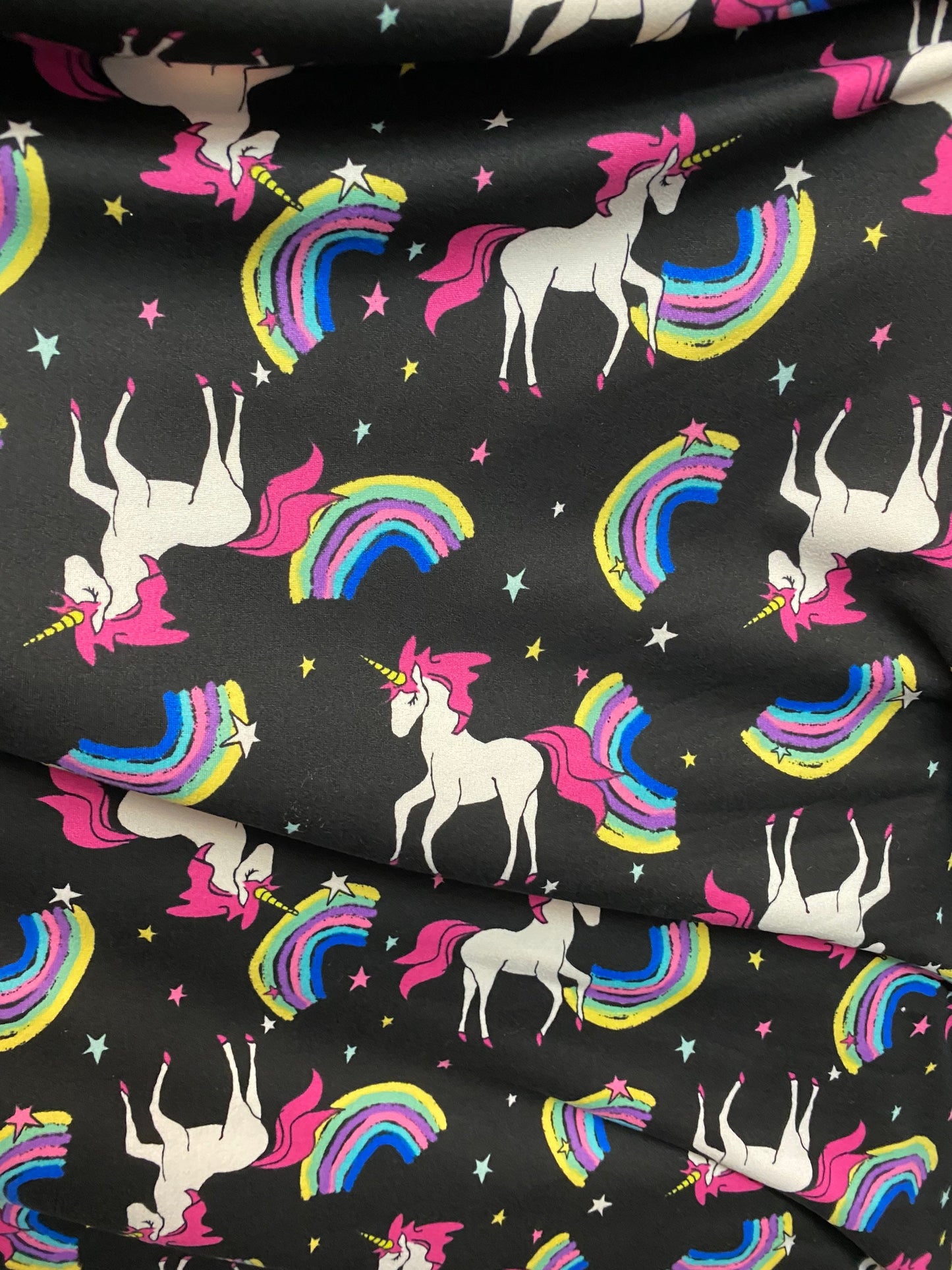 Unicorn design print on poly spandex matte 4way stretch medium weight 58/60” Sold by the YD. Ships Worldwide from Los Angeles California US