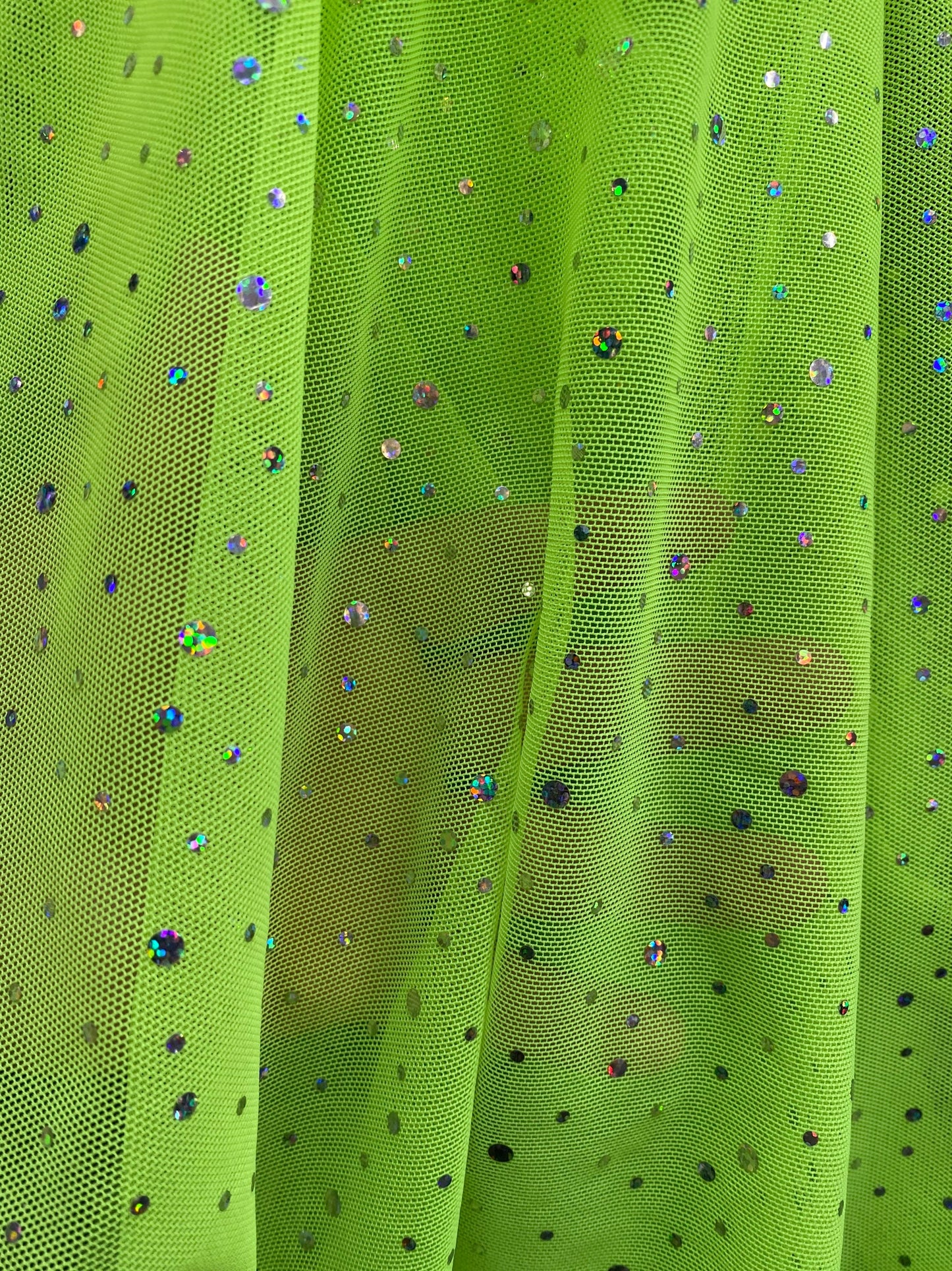 New power mesh neon green with hologram sequins all over 4-way stretch 58/60” Sold by the YD. Ships worldwide from Los Angeles California US