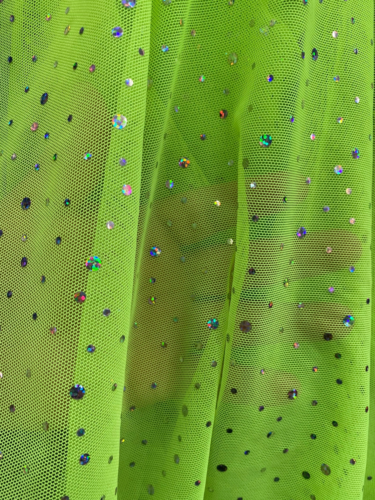 New power mesh neon green with hologram sequins all over 4-way stretch 58/60” Sold by the YD. Ships worldwide from Los Angeles California US