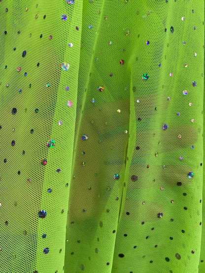 New power mesh neon green with hologram sequins all over 4-way stretch 58/60” Sold by the YD. Ships worldwide from Los Angeles California US