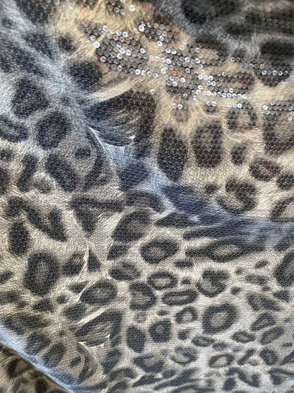 New Exotic leopard design with clear sequins all over lycra base 2-way stretch 58/60” Sold by the YD. Ships worldwide from Los Angeles cali