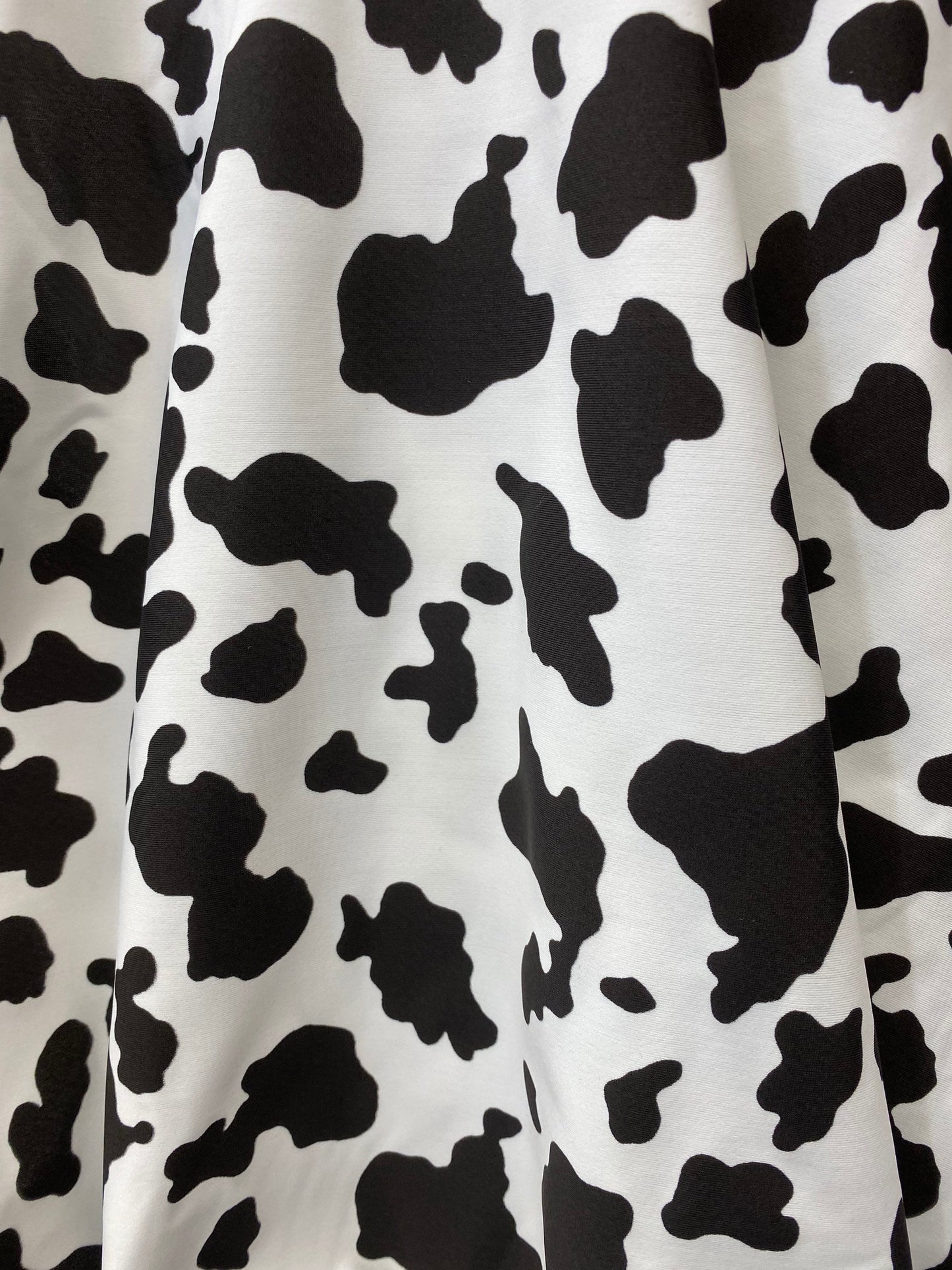 New Cow design print on great quality of nylon spandex 4-way stretch 58/60” Sold by the YD. Ships worldwide from Los Angeles California USA.