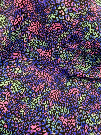 New leopard design purple/pink/green print on great quality of nylon spandex 4-way stretch 58/60” Sold by the YD. Ships worldwide