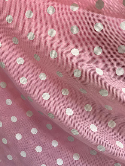 New polka dots design print on power mesh 4-way stretch pink/white 58/60” Sold by the YD. Ships worldwide from Los Angeles California USA.