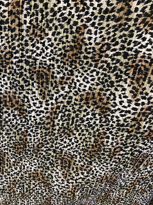 Exotic animal print leopard design print on pleated poly satin fabric 44/45” Sold by the YD. Ships Worldwide from Los Angeles California USA