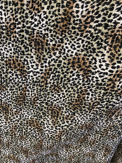 Exotic animal print leopard design print on pleated poly satin fabric 44/45” Sold by the YD. Ships Worldwide from Los Angeles California USA