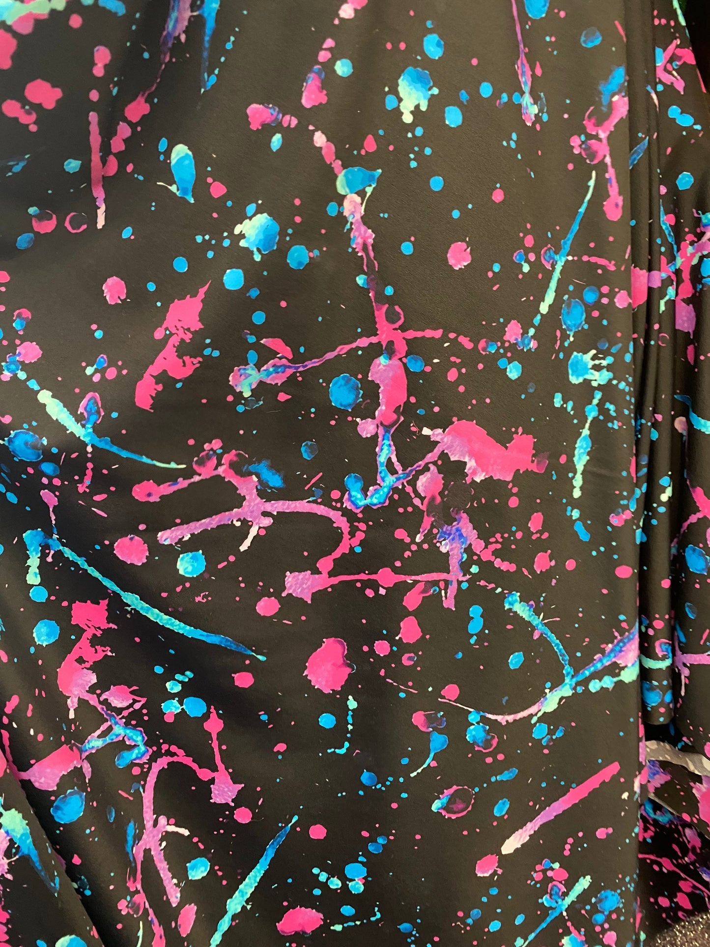 Graffiti paint design multicolor nylon spandex 4way Stretch 58/60” Sold by the YD. Ships worldwide from Los Angeles California USA.