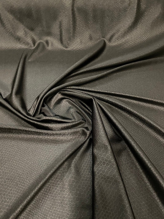 Dragon skin jumbo embossed great quality of nylon spandex 4-way stretch 58/60” Sold by the YD. Ships worldwide from Los Angeles California