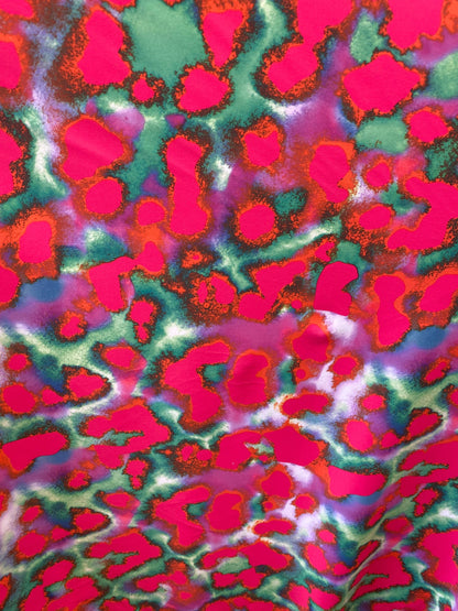 New lava design red/pink/ green print on best quality of nylon spandex 4-way stretch 58/60” Sold by the YD. Ships Worldwide from Los Angeles