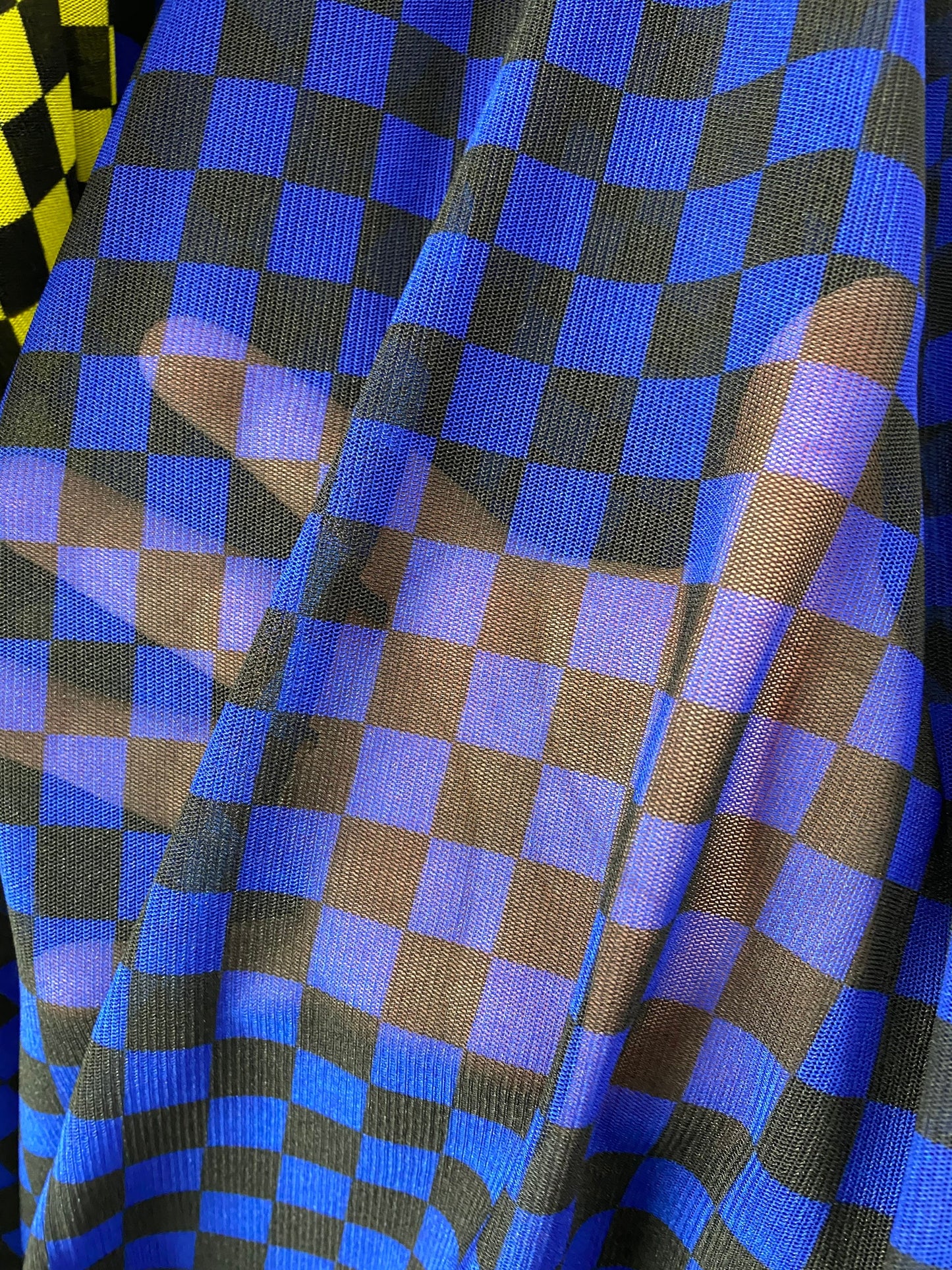 New small Checkered design print on power mesh 4-way stretch 58/60” Sold by the YD. Ships worldwide from Los Angeles California USA.