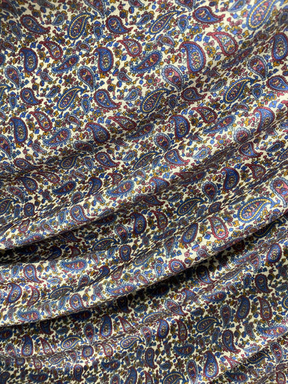 New paisley design white/multicolor print on great quality of stretch velvet 4-way stretch 58/60” Sold by the YD. Ships Worldwide from L.A